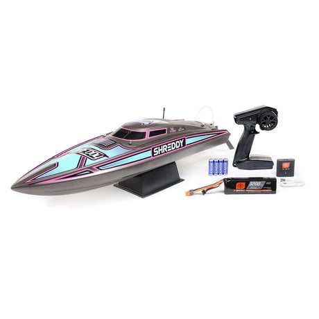 Proboat Heatwave Recoil 2 V2 26-inch self-righting remote control boat on water with sleek design and vibrant colors