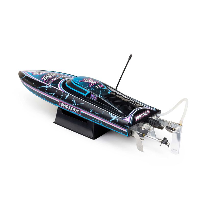 Proboat Recoil 2 18-inch self-righting brushless deep-V RC boat on water, showing sleek design and bright color scheme.