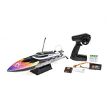 Proboat Recoil 2 18-inch self-righting brushless deep-V RC boat on water, showcasing its sleek design and bright color scheme.