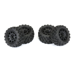 Set of four Proline 1/18 Badlands All-Terrain Truck Tires for Granite GROM remote control car, detailed tread pattern visible