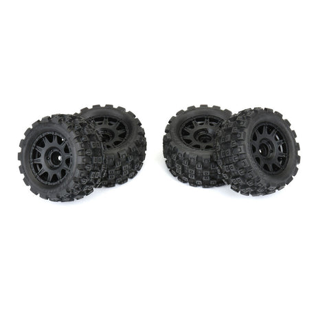 Set of four Proline 1/18 Badlands All-Terrain Truck Tires for Granite GROM remote control car, detailed tread pattern visible