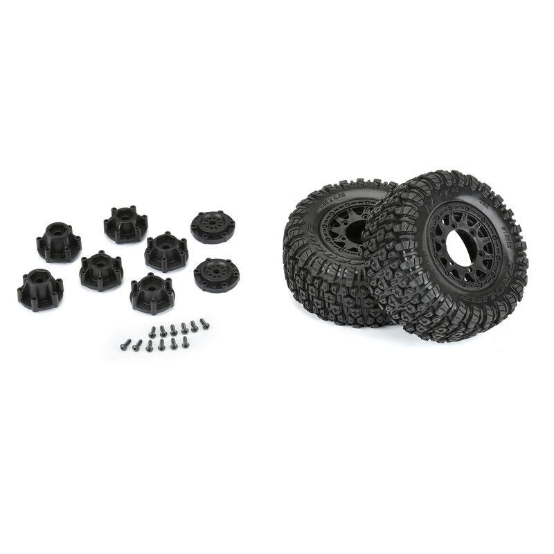 Pair of Proline Aztek SCT 2.2"/3.0" mounted tires for RC trucks, showing tread pattern and sidewall details.