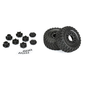 Pair of Proline Aztek SCT 2.2"/3.0" mounted tires for RC trucks, showing tread pattern and sidewall details.