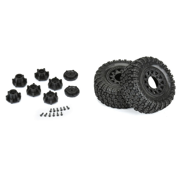 Pair of Proline Aztek SCT 2.2"/3.0" mounted tires for RC trucks, showing tread pattern and sidewall details.