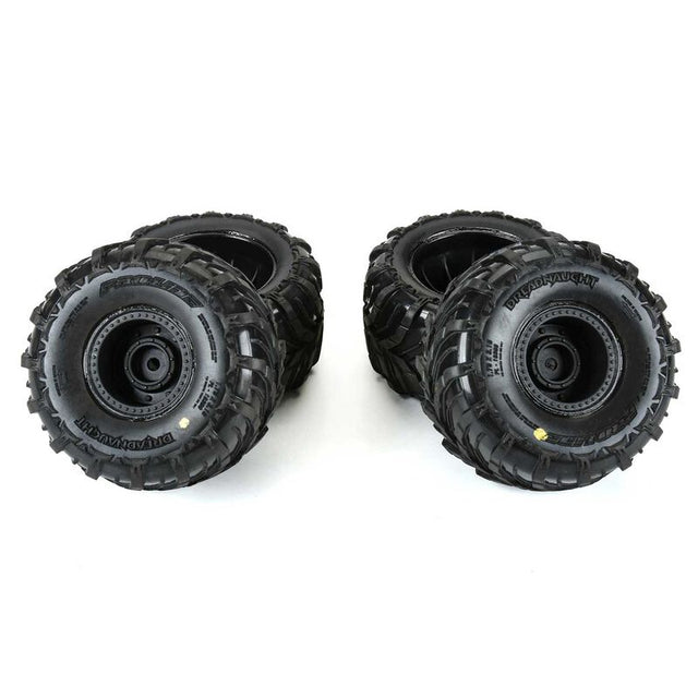 Proline Dreadnaught mounted tires for Gorgon and Quake GROM off-road RC vehicles, showing tread pattern and sidewall details.