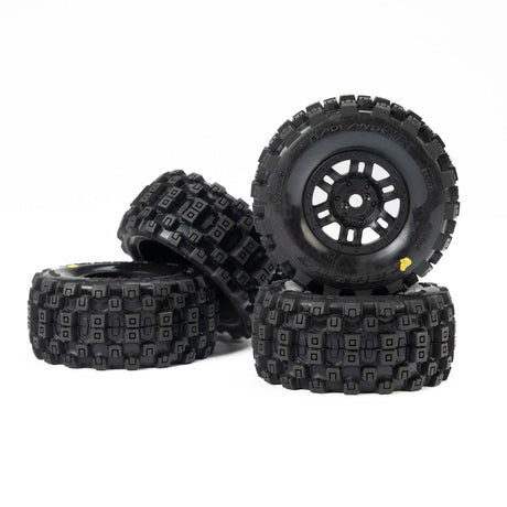 Set of four Proline Badlands MX front and rear tires for Mojave GROM, durable off-road motocross tires with aggressive tread.