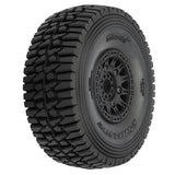 Pro Line Mirage TT 1/7 scale pre-mounted tires with 17mm wheels for remote control truck racing, shown on a racing vehicle.