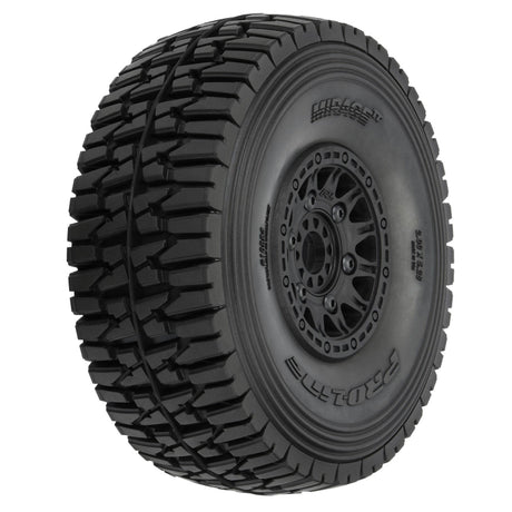 Pro Line Mirage TT 1/7 scale pre-mounted tires with 17mm wheels for remote control truck racing, shown on a racing vehicle.