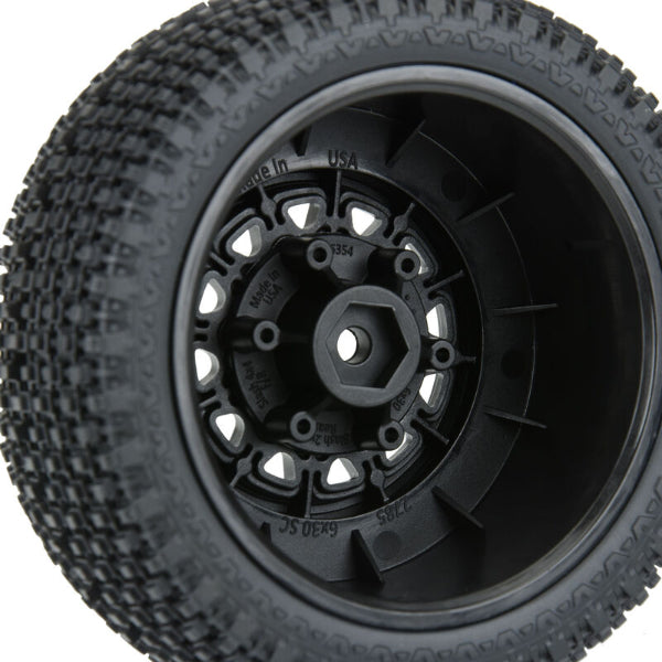 Proline Gladiator SC pre-mounted wheels with soft tires for 1/10 scale RC trucks, shown with detailed rubber treads and black rims.