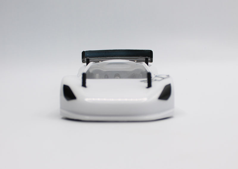 Reflex Racing RAD002 Mako GT 1/28 scale Lexan RC car body showing sleek black design and detailed body shell.