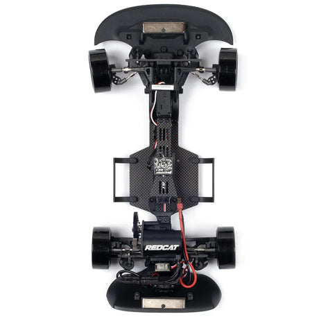 Redcat RDS 1/10 scale 2WD drift car chassis with red and black design, showcasing the sleek competition spec RC drift vehicle.