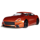Redcat RDS 1/10 scale 2WD competition drift car with orange body and detailed design, showcasing its sleek, high-performance RC vehicle.