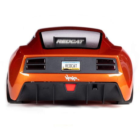 Orange Redcat RDS 1/10 scale 2WD competition drift car with sleek design and detailed body, perfect for RC drift racing enthusiasts.