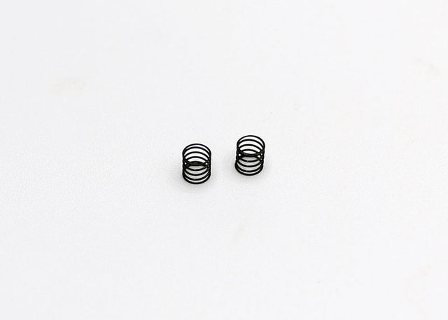 Black Reflex Racing RX28A-04 medium side spring for RC cars, shown in a close-up image.