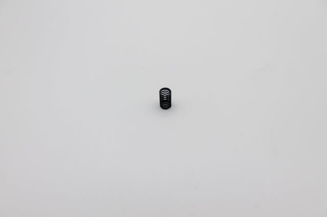 Reflex Racing RX28A-07 medium black center spring for RC cars, showing a close-up of the spring coil.