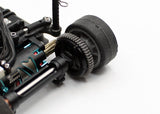 Reflex Racing RX28A-30 V3 spur gear and ball diff aluminum dust covers on a RC car component, showing protective covers and gear details.
