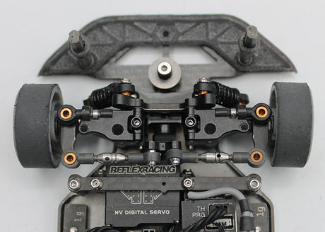 Reflex Racing RX28A-41 short steering horn for RC car, metal construction with mounting holes, compatible with RX28 model vehicles.