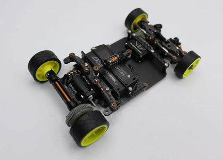 Reflex Racing RX28D Champions Edition 2WD RC car kit with detailed chassis and vibrant decals, designed for high-performance racing.