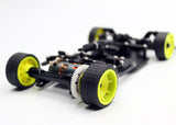 Reflex Racing RX28K 1/28 scale 2WD RC car kit Gen 2 with detailed chassis and vibrant red body, ready for assembly.