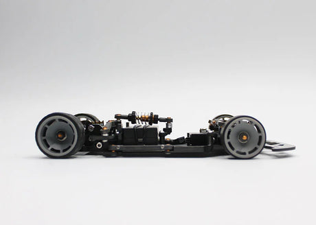 Reflex Racing RX28SE Champions Edition 2WD RC car kit with sleek design and detailed body in black and red.