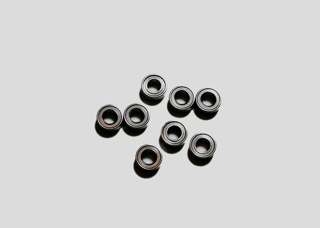 Reflex Racing RX402 high-speed steel bearing set for M3 front axle of RC car, showing precision metal bearings.
