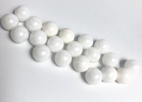 Reflex Racing RX409 2.381 zirconium oxide ceramic balls for RC car parts, showing smooth, spherical ceramic bearings.