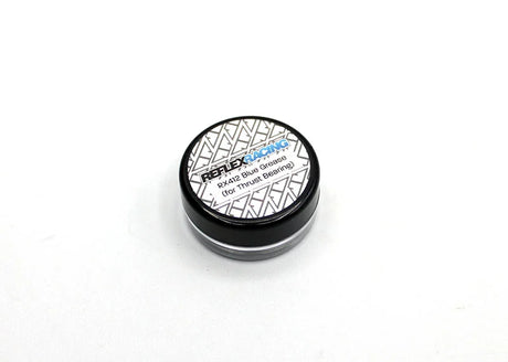 Reflex Racing RX412 Blue Thrust Grease for RC cars, 3g tube, shown in a close-up image with the blue grease visible in the tube.