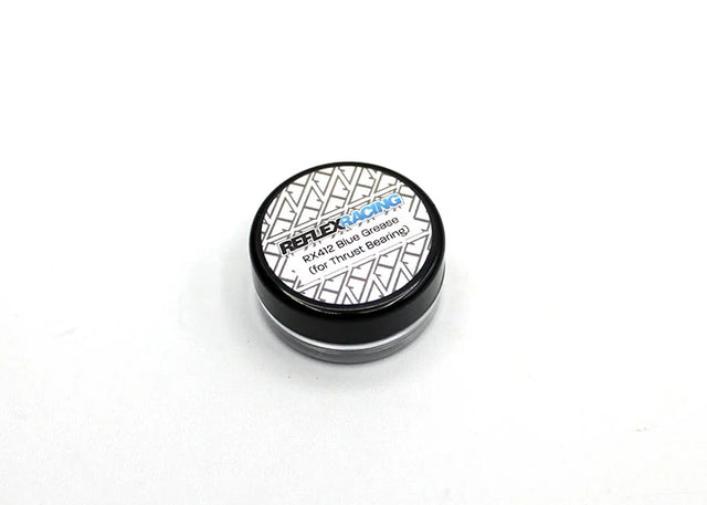 Reflex Racing RX412 Blue Thrust Grease for RC cars, 3g tube, shown in a close-up image with the blue grease visible in the tube.