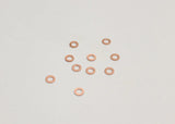 Reflex Racing RX501 M3x0.5mm rear axle shims for RC cars, set of 10, small metal spacers for precise wheel fitment.