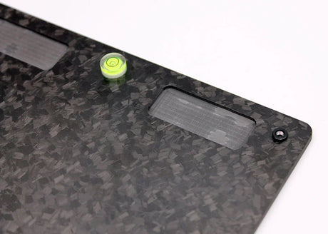 Reflex Racing RX521V2 forged carbon fiber RC car setup board, 165x200mm, with textured surface and branding details.