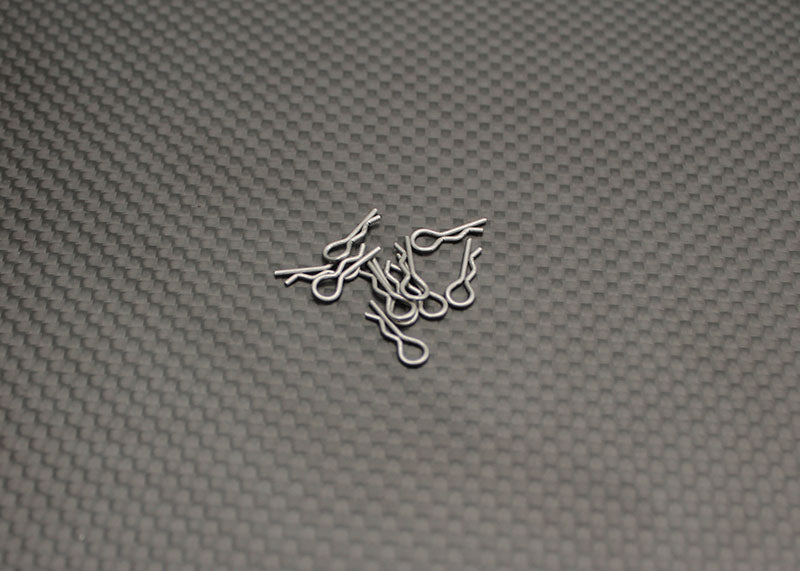 Reflex Racing RX522 Mini Body Clips for RC car body attachment, shown on a black background.