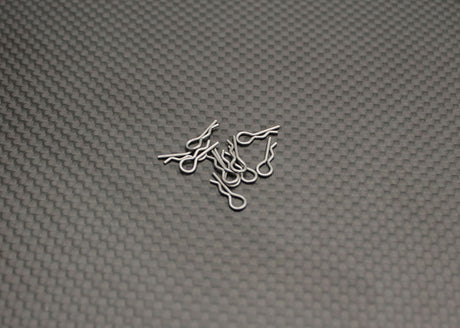 Reflex Racing RX522 Mini Body Clips for RC car body attachment, shown on a black background.