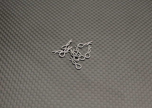 Reflex Racing RX522 Mini Body Clips for RC car body attachment, shown on a black background.