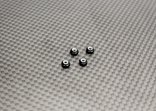 Reflex Racing RX525 aluminum black wheel nuts for RC cars, close-up of durable, lightweight RC car parts with a sleek finish.