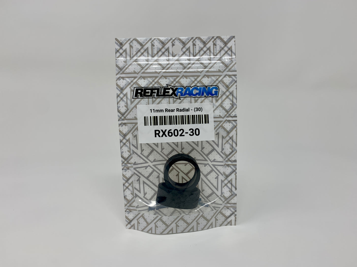 Reflex Racing RX602-30 11mm radial tire with 30° tread angle, designed for RC car racing, shown in the image.