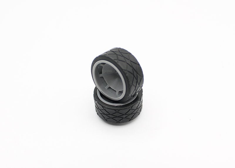 Reflex Racing RX602-30 11mm radial tire with 30° tread pattern for RC cars, showing the tire's sidewall and tread design.