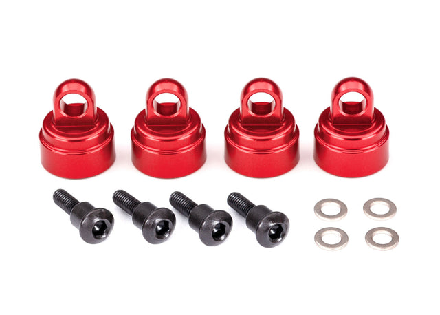 Set of four red aluminum shock caps for Traxxas RC vehicles, showcasing durable, lightweight shock absorber upgrades.