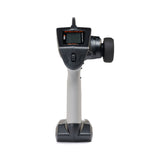 Spektrum DXC+ 12-channel DSMR+ RC transmitter with SR615 receiver, featuring ergonomic controls and LCD display.