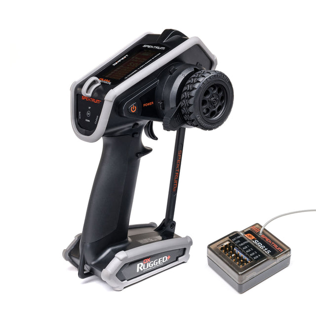 Spektrum DX Rugged+ 12-channel DSMR+ transmitter with SR615 receiver, showcasing sturdy design and control sticks.