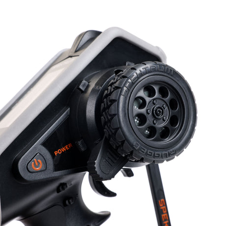 Spektrum DX Rugged+ 12-channel DSMR transmitter with SR615 receiver and rugged design for RC hobby use.