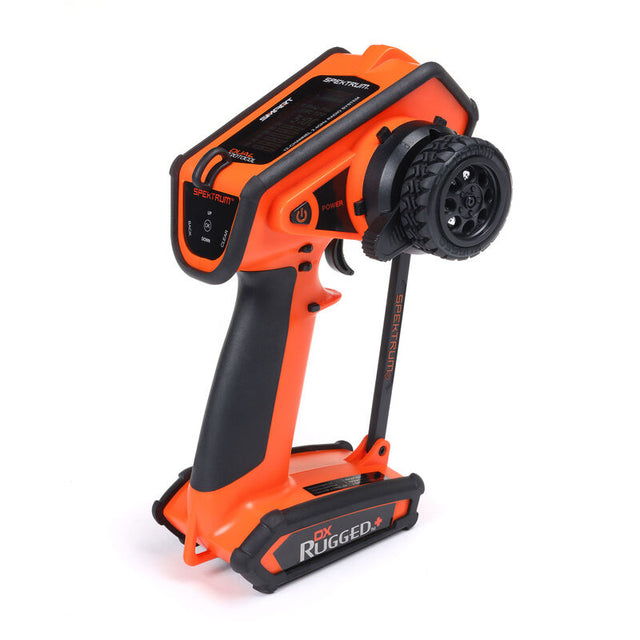 Spektrum DX Rugged+ 12-channel DSMR+ transmitter with durable design and multiple control sticks, shown in black with ergonomic grips.