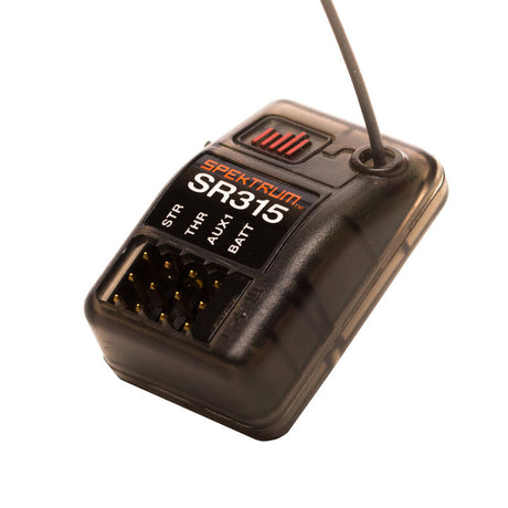 Spektrum SR315 DSMR 3-channel receiver with black plastic casing and visible antenna connector for remote control models.