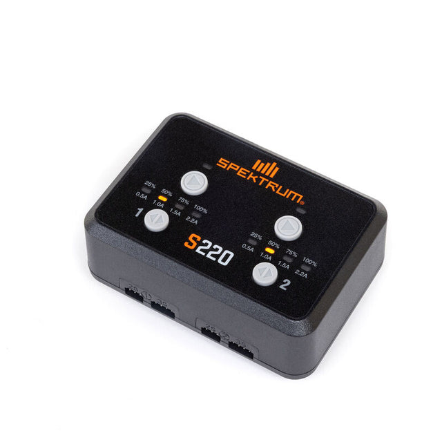 Spektrum S220 AC 2x20W balance charger with LCD display and multiple charge ports for RC batteries.