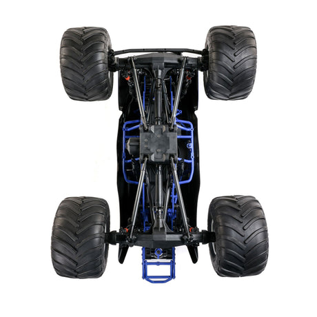 Losi Son-Uva Digger LMT 2.0 1/8 scale remote control monster truck on a dirt track, showing its rugged design and large tires.