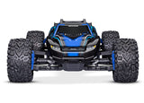 Traxxas Rustler 4X4 BL-2s remote control truck on a dirt surface, showcasing its off-road design and rugged tires.