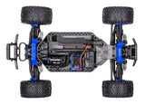 Traxxas Rustler 4X4 BL-2s remote control truck with black and red body, off-road tires, and detailed design.
