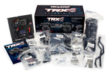 Traxxas TRX-4 Crawler Kit clipless with remote control, battery, and tools for off-road RC crawling adventures.