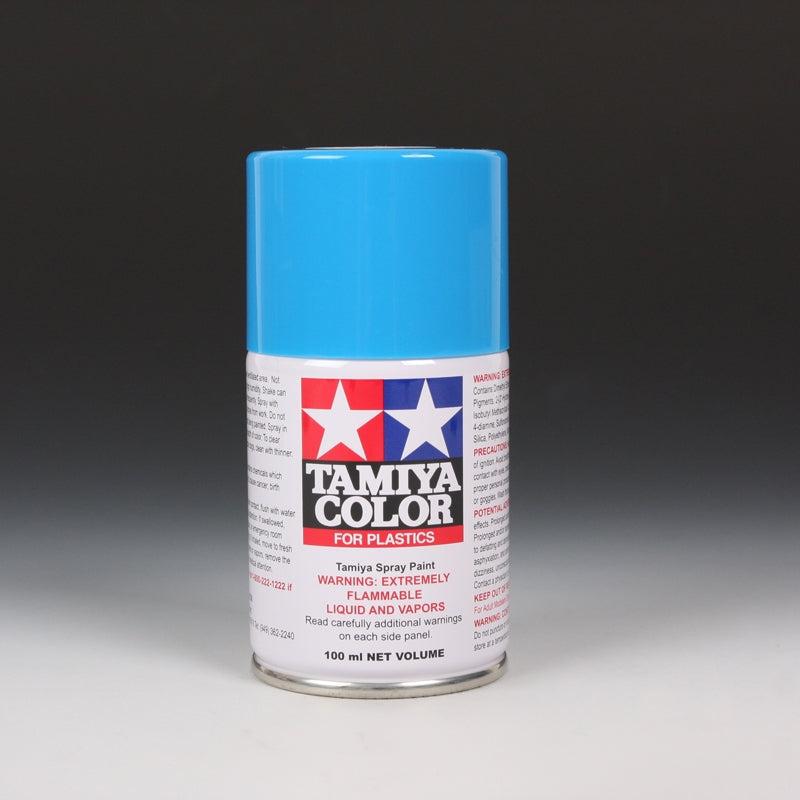 Tamiya TS-10 French Blue spray paint in a 100ml can, shown with the blue spray nozzle and label on the can.