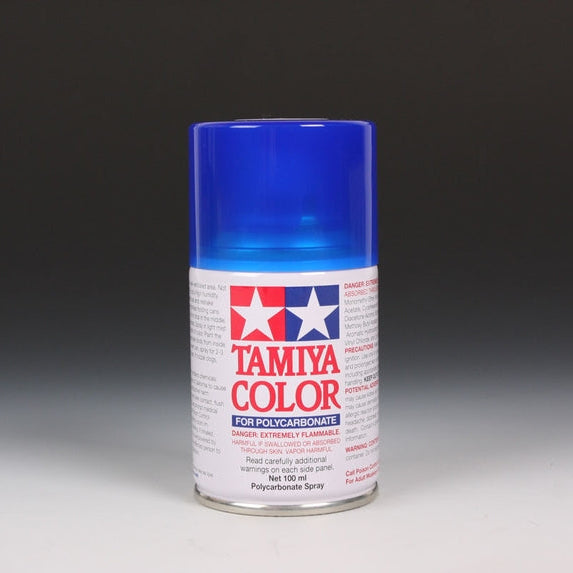 Tamiya PS-38 Transparent Blue spray paint in a 100ml bottle, ideal for model detailing and finishing projects.