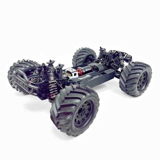 Tekno MT410 2.0 1/10 electric 4x4 Pro monster truck kit with detailed chassis and rugged tires for off-road racing.